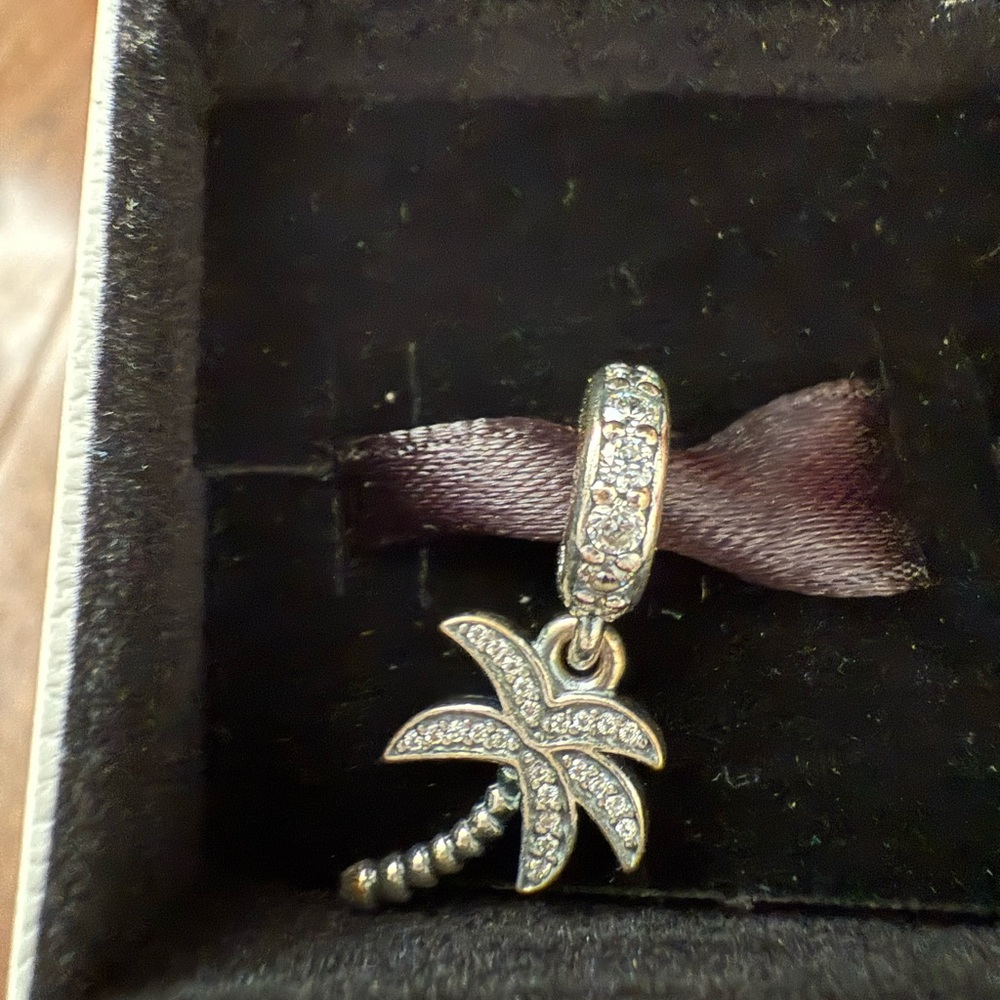 Pandora Palm Tree Charm. NIB. NEVER USED. 
RETIRED - Picture 2 of 4